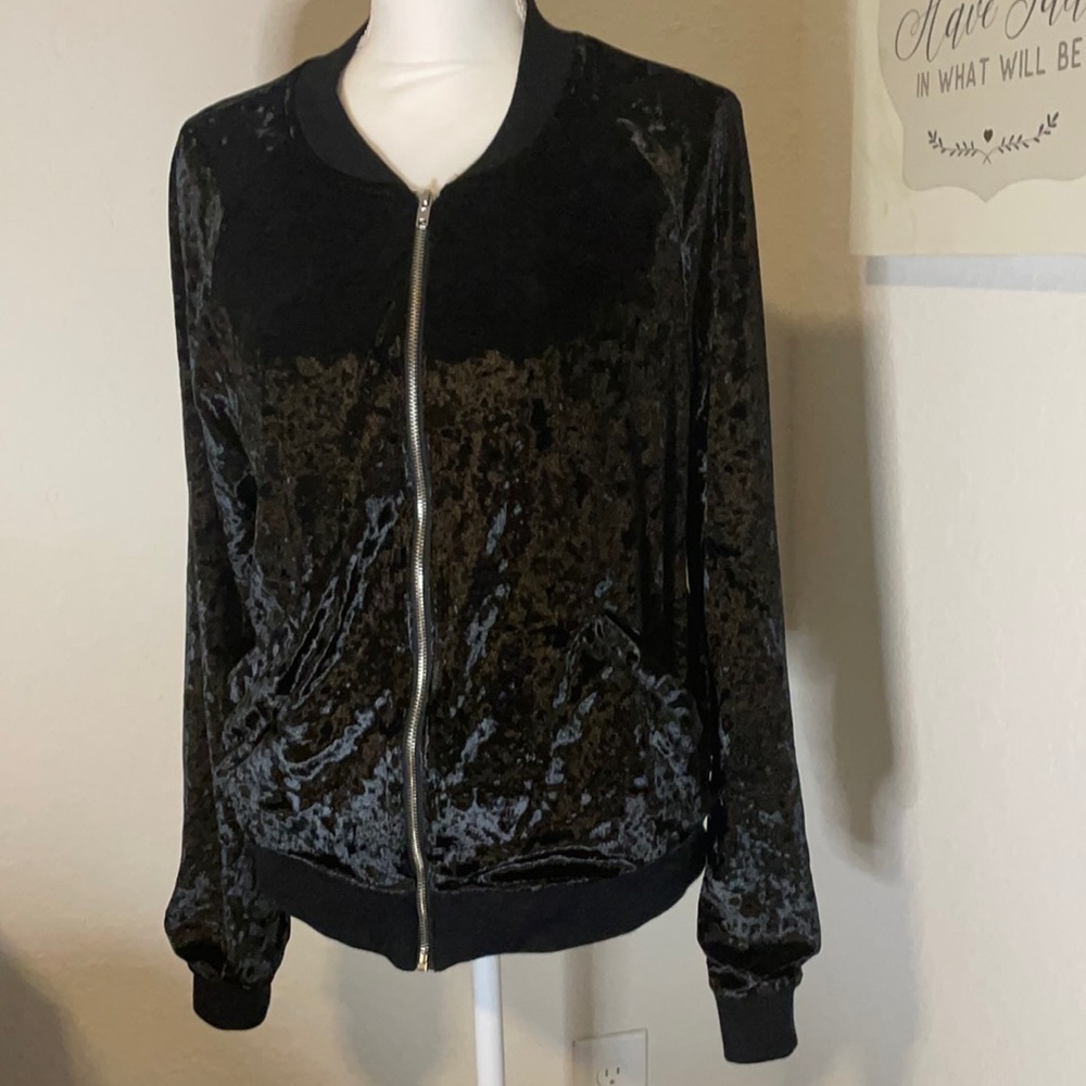 Used black zipper bomber